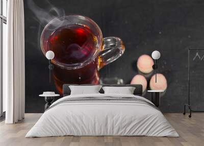 the Cup of tea on a dark background. Wall mural