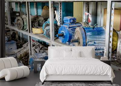 The warehouse of electric motors, broken electric motors are for repair for spare parts. Wall mural