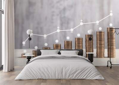  Coins on white table with profit graph. Wall mural