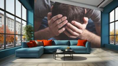 Caucasian depressed man at home. Mental health Wall mural