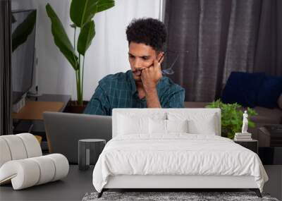 Brazilian Black Business Man Working at Home. Young Man Doing Home Office During the day at desk With Laptop Wall mural