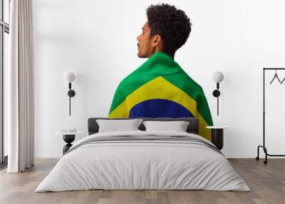 September seven, Brazil Independence Day. Black man holds Brazilian flag isolated. Wall mural