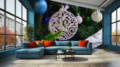 Christmas Tree with white, silver and blue details and xmas symbols like balls Wall mural