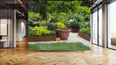 horizontal image of a garden with many plants very neat and tidy Wall mural