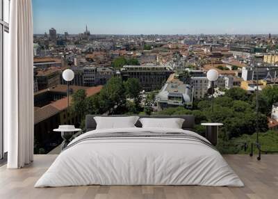 Italy, Milan , drone aerial view Duomo Cathedral  in downtown of the fashion city from  Giardini di Porta Venezia Montanelli park . Milan Green city  Wall mural