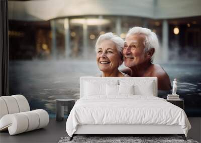 An elderly couple having a bath in a thermal water pool. Wall mural