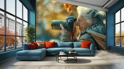 Retired senior woman baby boomer retirement fun hobby plan photography outside in nature.  People lifestyle photo.  Wall mural