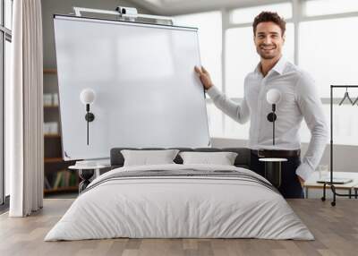 Business man presenting on a white board in a modern office Wall mural