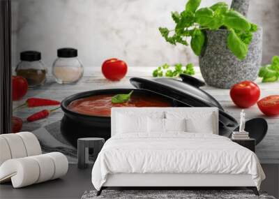 Traditional tomato cream soup and food ingredients. Wall mural