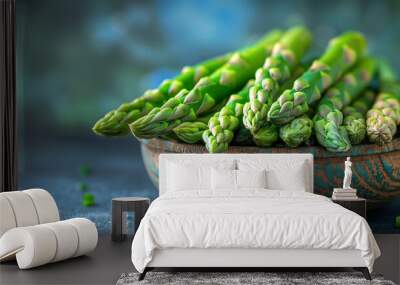 Fresh Asparagus in Bowl on Dark Background Wall mural