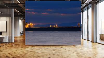 Image of a ship at dusk Wall mural