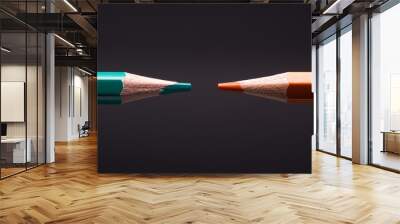 Two colour pencils in the colours of orange and teal, the famous contemporary colour scheme Wall mural