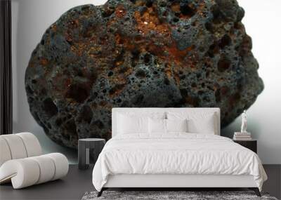 Reddish black volcanic basalt rock on white background Wall mural