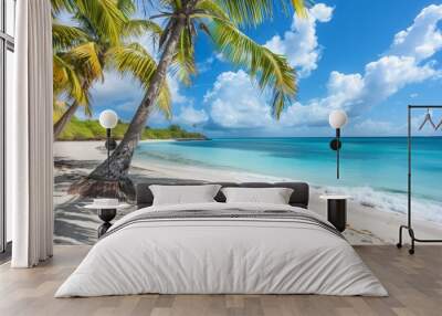 A beautiful beach with palm trees and a clear blue ocean Wall mural