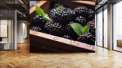 A wooden box full of blackberries Wall mural