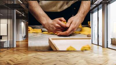 The chef prepares the cappellacci with ricotta and spinach Wall mural