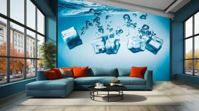 Ice cubes falling under water Wall mural