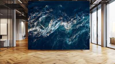 Waves of water of the river and the sea meet each other during high tide and low tide. Wall mural