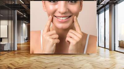 close up of a young woman beautiful smile, healthy lips and white teeth in high resolution Wall mural