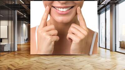 lip protection. isloated close up of a young woman beautiful smile, healthy lips and white teeth Wall mural