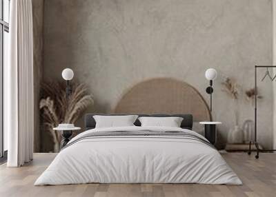 Minimalistic bedroom interior in rustic style. Wicker boho headboard and concrete textured elements. Wall mural