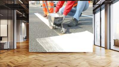 MINSK, BELARUS - 18 FEBRUARY, 2022: workers apply road markings on the road Wall mural