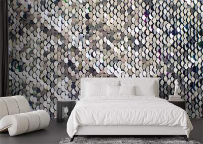 Pieces of cloth with silver sequins. Glitter background. Sequin texture Wall mural