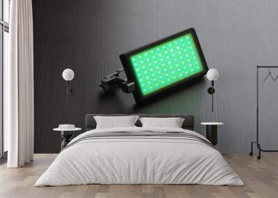 RGB light on a dark background. Green light. Wall mural