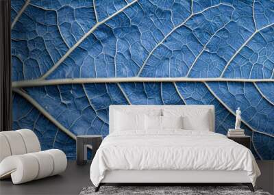 Shimmering blue tree leaf skeleton texture background showcasing intricate patterns and details. Wall mural