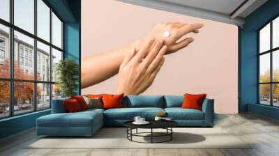 skincare. close up view of woman hand moisturising them with cream. skincare Wall mural