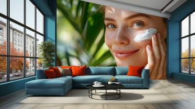 Smiling woman applying moisturizer cream for skin care   beauty and cosmetics concept Wall mural