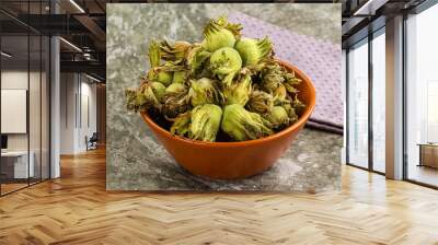 Fresh green ripe hazelnut heap Wall mural