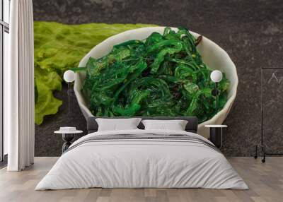 Green Chuka Seaweed Salad Isolated on White Background Top View. Wakame Sea Kelp Salat Wall mural