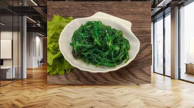 Green Chuka Seaweed Salad Isolated on White Background Top View. Wakame Sea Kelp Salat Wall mural