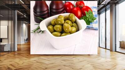 Green marinated olives in the bowl Wall mural