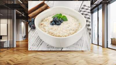 Oats porridge with blueberry Wall mural