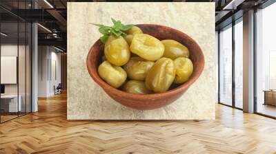 Pickled green tomato in the bowl Wall mural