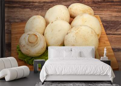 Raw champignons over the board Wall mural