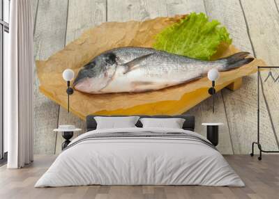 Raw Dorada fish  for cooking Wall mural