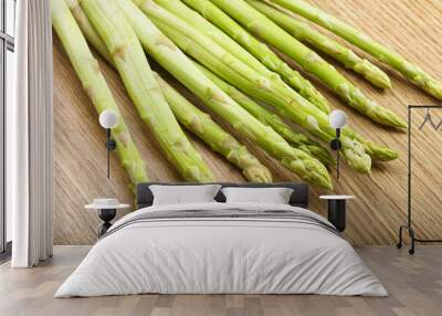 Raw green uncooked asparagus sprout Wall mural