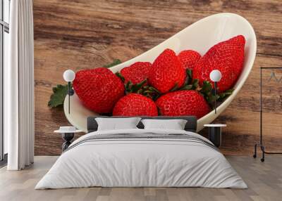 Ripe sweet strawberry with leaf Wall mural