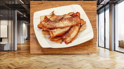 Roasted juicy bacon in the plate Wall mural