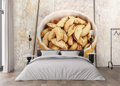 Shelled dry almond nut heap Wall mural