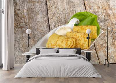 Stuffed pancakes with cream sauce Wall mural