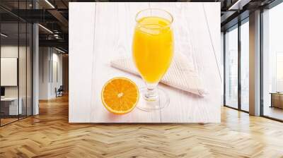 Sweet fresh orange juice in the glass Wall mural