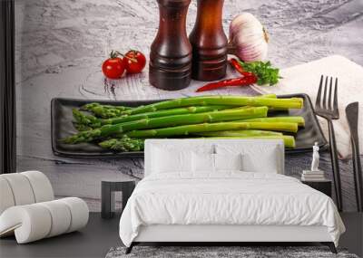 Vegan cuisine - Boiled asparagus with oil Wall mural