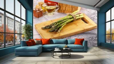 Vegan raw green asparagus heap Wall mural