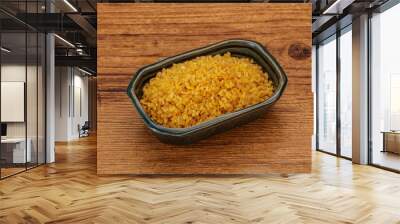 Vegetarian cuisine - dry bulgur for cooking Wall mural