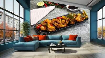 Vietnamese cuisine - fried frog with vegetables Wall mural