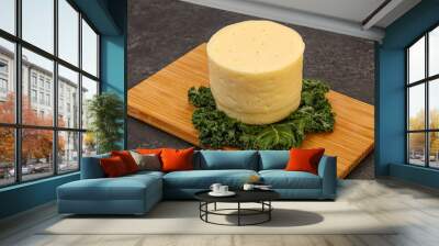 Yellow round dairy soft cheese Wall mural